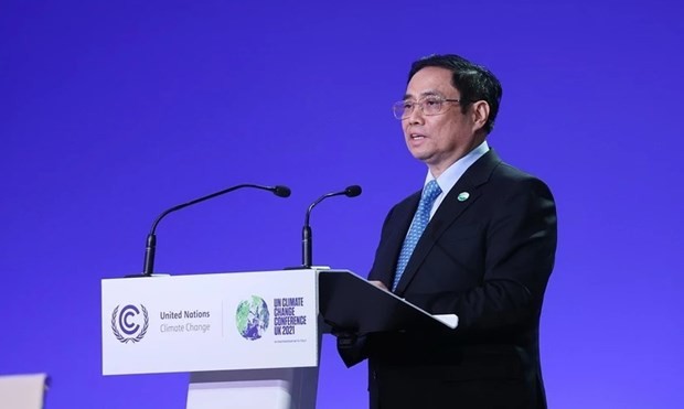 Le Premier ministre Pham Minh Chinh prend la parole au Sommet mondial sur l'action climatique dans le cadre de la COP26. Photo : VNA.