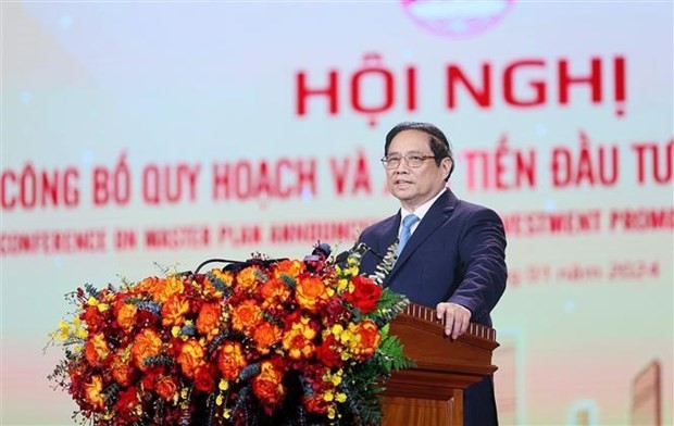 Le Premier ministre Pham Minh Chinh s'adresse à la conférence sur l’annonce du plan directeur et la promotion des investissements de la province de Hai Duong. Photo : VNA. 