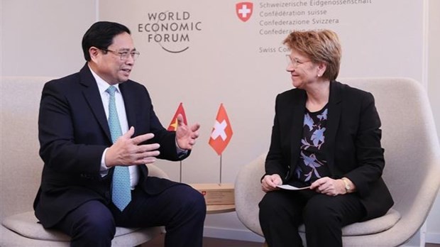 Le Premier ministre Pham Minh Chinh et la présidente suisse Viola Amherd. Photo: VNA