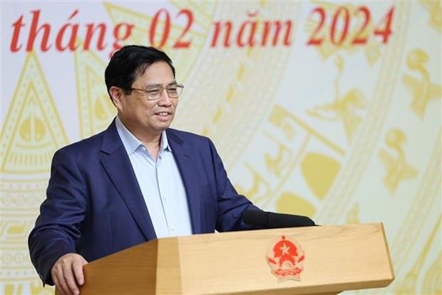 Le Premier ministre Pham Minh Chinh s'exprime lors de la séance de travail avec le Comité de gestion de capitaux publics dans les entreprises et 19 groupes et compagnies générales relevant du Comité. Photo : VNA.