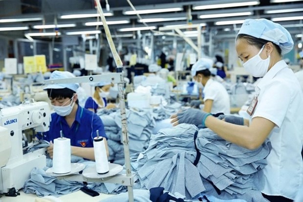 Le revenu moyen des travailleurs vietnamiens a augmenté de 6,9% en 2023. Photo : VNA.