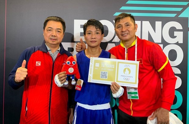 La boxeuse Vo Thi Kim Anh (milieu). Photo : hanoimoi.vn