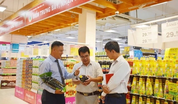 Des produits vietnamiens présentés dans un supermarché. Photo d'illustration : VNA.