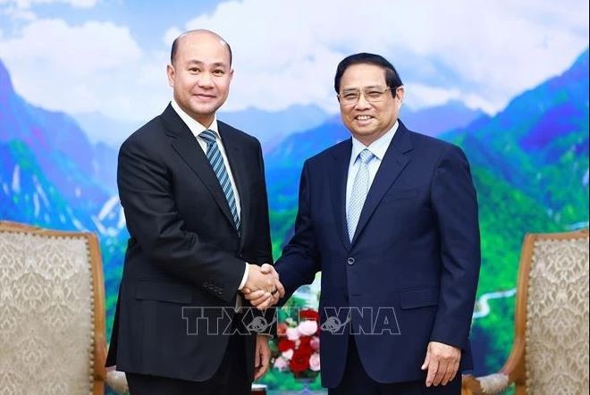 Le Premier ministre Pham Minh Chinh a reçu le 5 juillet à Hanoï Hun Many, membre de la Permanence du Parti du peuple cambodgien, secrétaire général de la Commission centrale de mobilisation de masse du Parti. Photo : VNA.