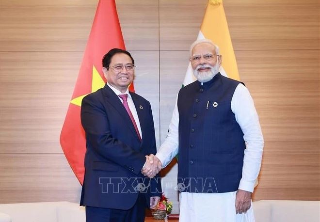 Le Premier ministre Pham Minh Chinh (à gauche) et son homologue indien Narendra Modi. Photo ; VNA.