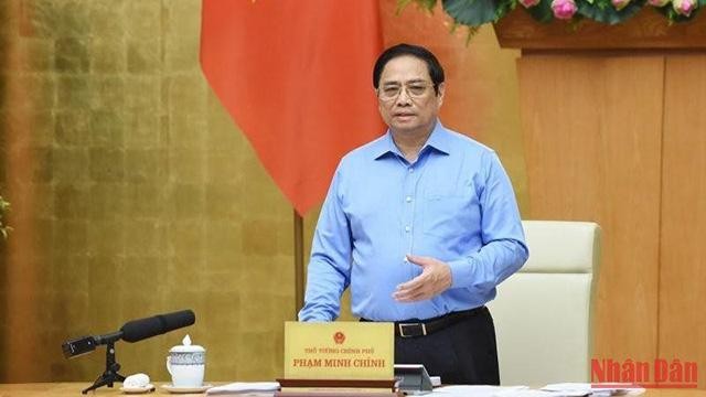 Le Premier ministre Pham Minh Chinh préside la réunion périodique d'août du gouvernement, le 5 septembre. Photo : NDEL.