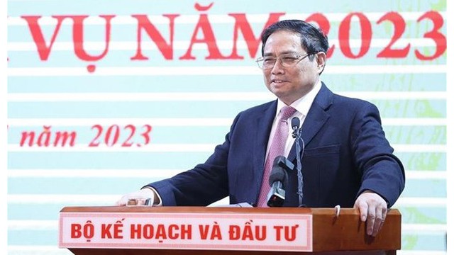 Le Premier ministre Pham Minh Chinh s’adressant à la conférence hybride au siège du MPI à Hanoi avec 63 provinces et villes. Photo : VNA