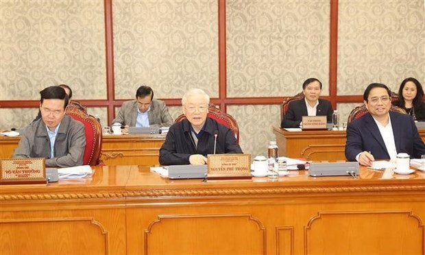Le Secrétaire général du Parti Nguyên Phu Trong (au centre) lors de la réunion du Bureau politique, à Hanoi, le 30 mars. Photo : VNA.