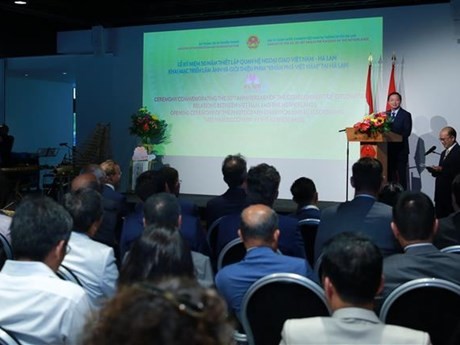 Le vice-Premier ministre Tran Hong Ha prend la parole lors de la cérémonie marquant le 50e anniversaire de l'établissement des relations diplomatiques Vietnam - Pays-Bas. Photo: VNA