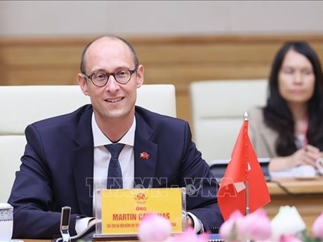 Le président du Conseil national de la Suisse, Martin Candinas en visite officielle au Vietnam. Photo: VNA