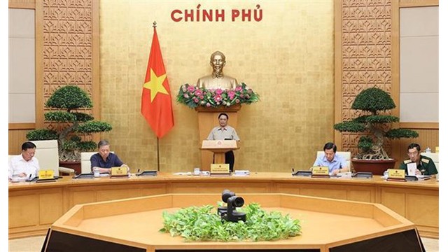 Le Premier ministre Pham Minh Chinh préside la réunion. Photo : VNA.