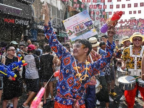 Lors du festival traditionnel du Nouvel An de Songkran en Thaïlande. Photo : AFP/VNA