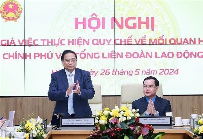 Le Premier ministre Pham Minh Chinh lors de la conférence. Photo : VNA.