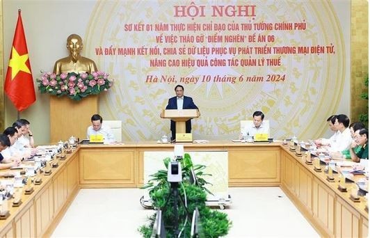 Le Premier ministre Pham Minh Chinh lors de la conférence. Photo: VNA