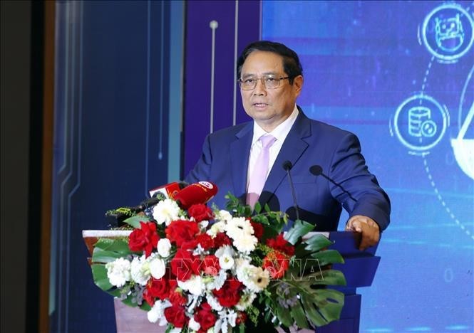 Le Premier ministre Pham Minh Chinh s’exprimant lors de la conférence de présentation du modèle réussi de transformation numérique aux niveaux ministériel et sectoriel des juridictions populaires. Photo : VNA.