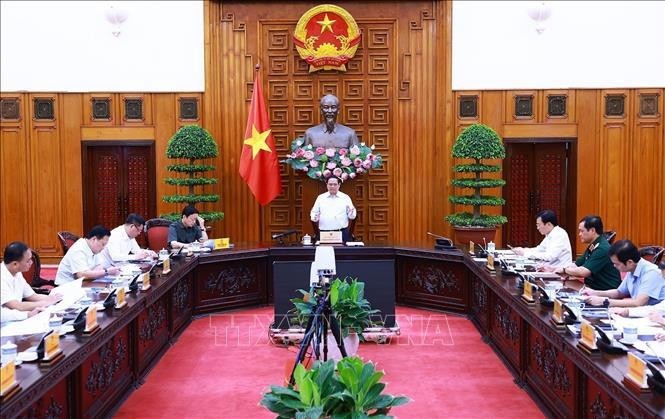 Le Premier ministre Pham Minh Chinh s’exprime lors de la réunion, à Hanoi, le 22 juillet. Photo : VNA.