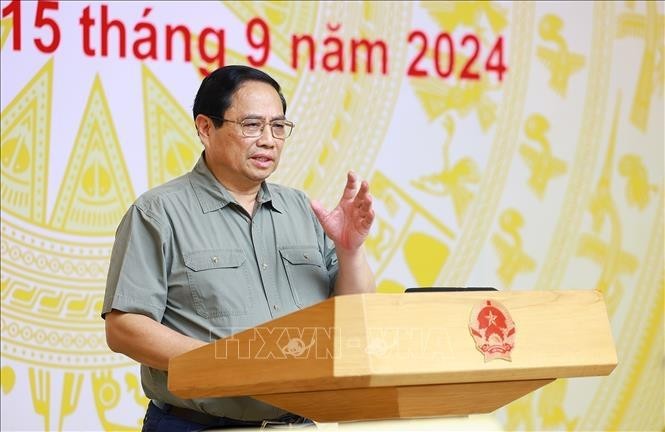 Le Premier ministre Pham Minh Chinh appelle à agir pour régler efficacement les conséquences du typhon Yagi et atteindre l'objectif de croissance. Photo : VNA.