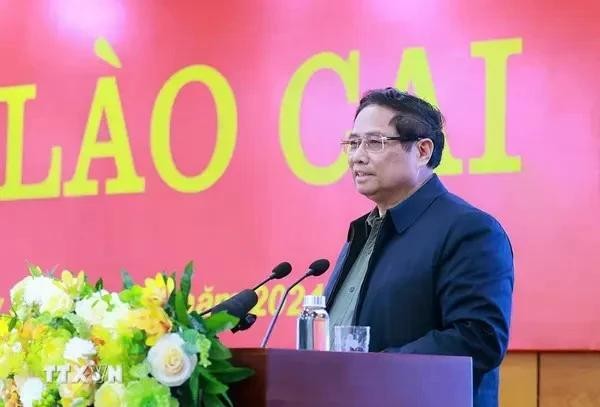 Le Premier ministre Pham Minh Chinh prend la parole lors de l'esvenement à Lao Cai. Photo : VNA.