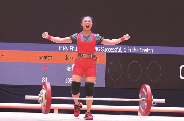 L’haltérophile Không My Phuong est comblée de joie après une tentative réussie lors des SEA Games 31, disputés en mai 2022 au Vietnam. Photo : CTV/CVN