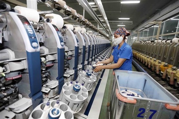 Usine de fil Hoa Xa de la société par actions de textiles et d'habillements de Nam Dinh, l'une des sociétés de premier rang dans la production de fils pour le marché national et les exportations. Photo: VNA