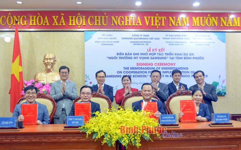 La cérémonie de signature. Photo : binhphuoc.gov.vn