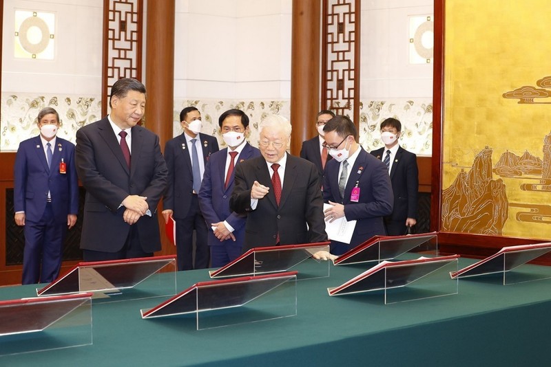 Le Secrétaire général du PCV Nguyên Phu Trong et le Secrétaire général du PCC Xin Jiping se rencontrent le 31 octobre 2022. Photo: baoquocte.vn