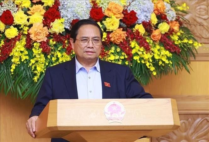 Le Premier ministre Pham Minh Chinh travaille à Hanoï avec le Conseil consultatif de politiques. Photo : VNA.