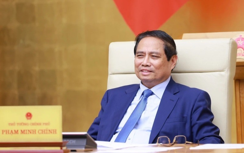 Le Premier ministre Phạm Minh Chính préside une réunion du gouvernement sur l'état de la décentralisation, de la répartition de pouvoir et de compétences liées au modèle d’organisation administrative à deux niveaux. Photo : VNA.