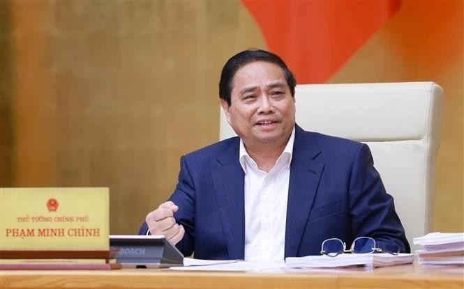 Le Premier ministre Pham Minh Chinh s’exprime lors de la réunion thématique de mai du gouvernement, à Hanoi, le 22 mai. Photo : VNA.
