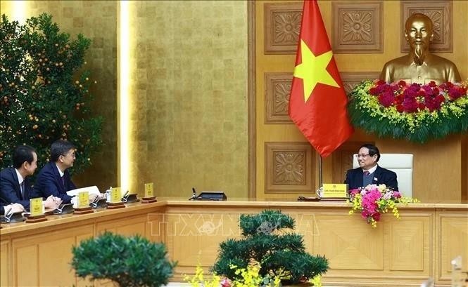 Le Premier ministre Pham Minh Chinh reçoit Chen Gang, membre du Comité central du Parti communiste chinois (PCC), secrétaire du Comité du PCC et président du Comité permanent de l'Assemblée populaire de la région autonome Zhuang du Guangxi, Chine. Photo : VNA. 