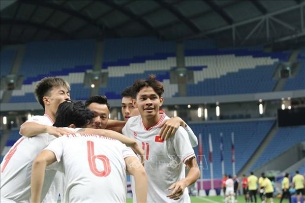 La joie des eurs vietnamiens. Photo : VFF/VNA
