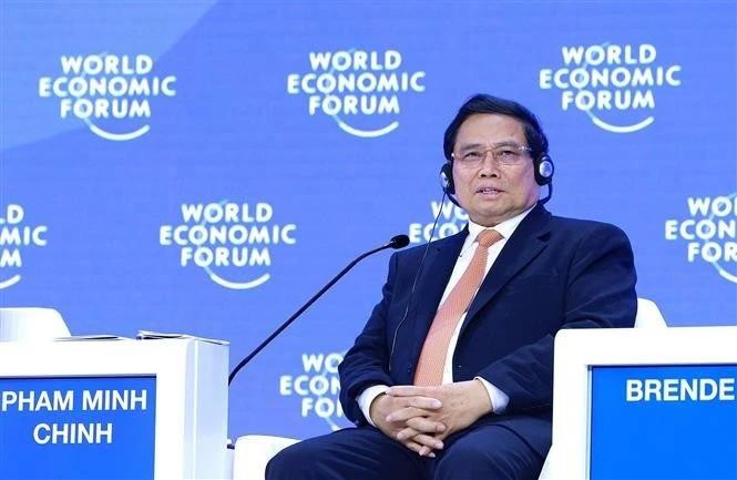 Le Premier ministre vietnamien Pham Minh Chinh lors de la séance de discussion, dans le cadre de la 55e réunion annuelle du WEF à Davos, en Suisse, le 22 janvier. Photo : VNA. 