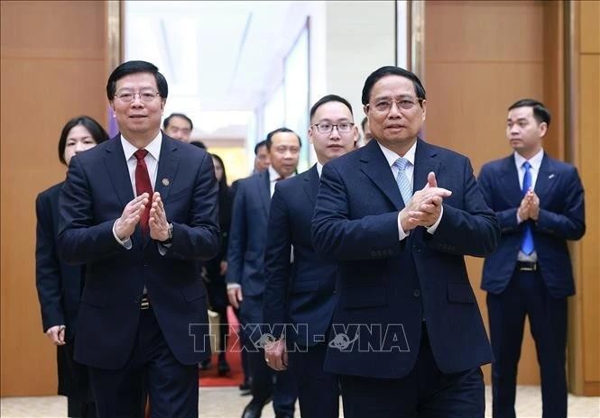 Le Premier ministre Pham Minh Chinh et Qiu Yong, secrétaire du Comité du PCC de l’Université Tsinghua. Photo: VNA 