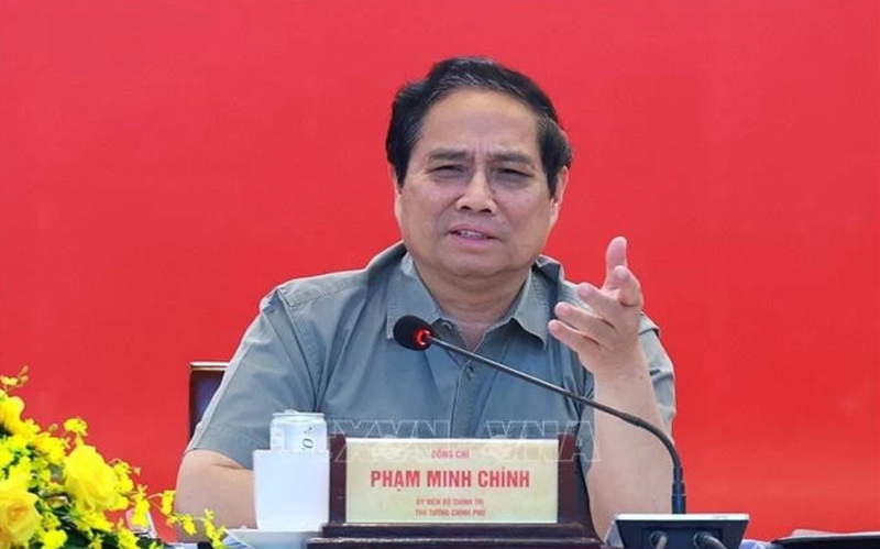 Le Premier ministre Pham Minh Chinh s’exprime lors de la séance de travail avec les autorités municipales et le Comité de pilotage 1568 chargé d’examiner et de traiter les obstacles liés à divers projets à Hô Chi Minh-Ville. Photo : VNA.