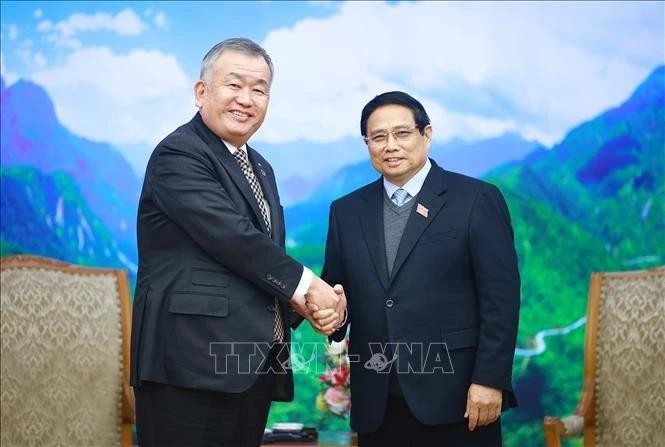 Le Premier ministre Pham Minh Chinh (droite) et le directeur général et président du Yamato Holdings, Nagao Yutaka. Photo : VNA 