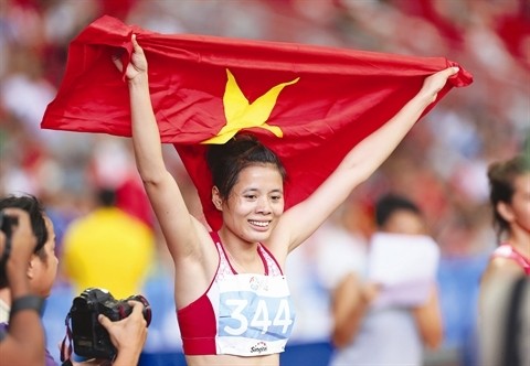 Nguyên Thi Huyên a battu le record des SEA Games en 400m haies dames, grâce à un chrono de 56’15’’. Photo: Quôc Khanh/VNA/CVN.