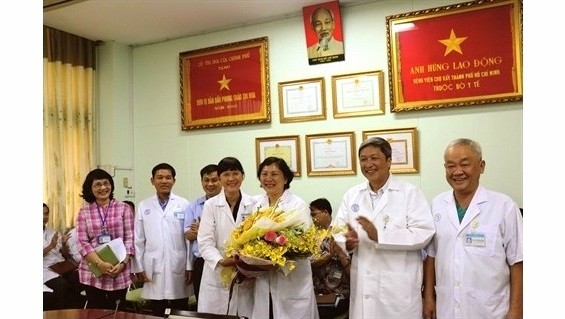 Mme Pham Thi Ngoc Thao (premier plan, à droite), lauréate du prix Kovalevskaïa. Photo: CVN.