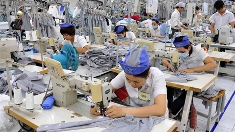 Le textile vietnamien est particulièrement attrayant pour les investisseurs américains. Photo: VNA.