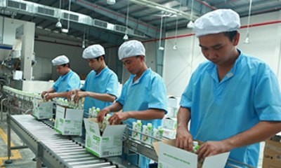 Dans l'usine de production et de transformation de l’eau de coco 100% naturelle de la société Betrimex. Photo: betrimex.com.vn.