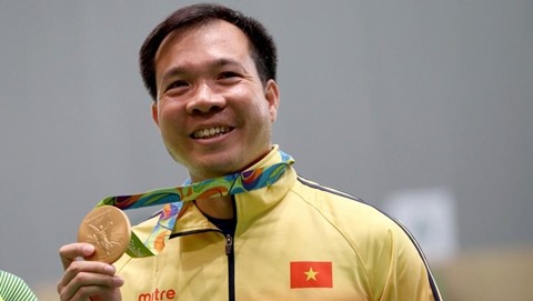 Hoàng Xuân Vinh restera dans l'histoire comme le premier champion olympique vietnamien. Photo: VGP.