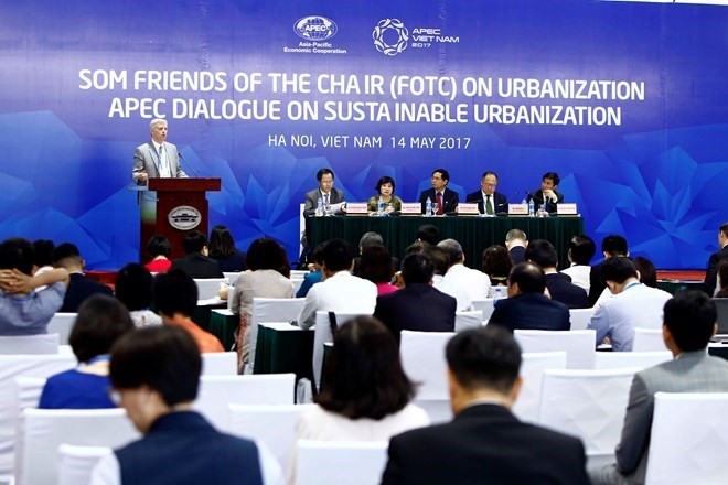 Des délégués lors du dialogue sur l'urbanisation durable, tenu le 14 mai, à Hanoi. Photo: VNA. 