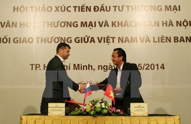 Signature du mémorandum de coopération sur l’investissement vers le Complexe industriel Moscou - Hô Chi Minh-Ville en 2014. Photo: VNA.