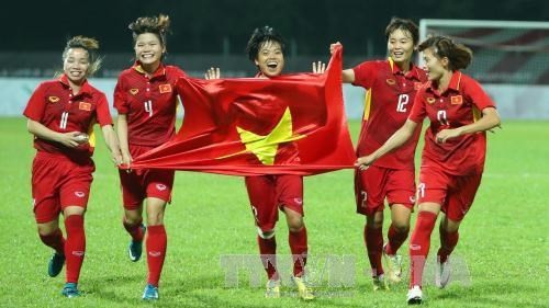 Les Vietnamiennes célèbrent leur 5ème victoire aux SEA Games. Photo: VNA.