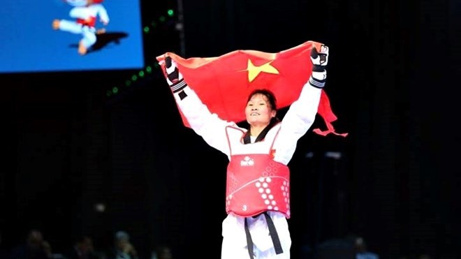 Hà Thi Nguyên remporte une médaille d’or en taekwondo. Photo: VNA.