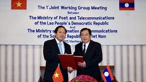 Signature d'un accord de coopération Vietnam - Laos dans l'information et la communication. Photo: infonet. 
