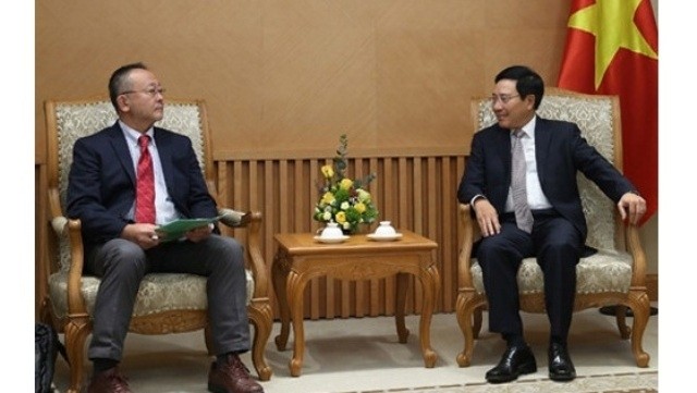Le Vice-Premier ministre, Pham Binh Minh (à droite) et le secrétaire général du RSCD-AP, Shoya Yoshida. Photo : VGP.