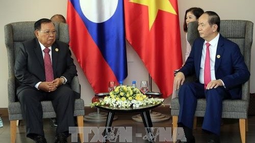 Le Président vietnamien, Trân Dai Quang (à droite), et le Secrétaire général du Comité central du PPRL et également Président laotien, Bounnhang Vorachith. Photo: VNA.