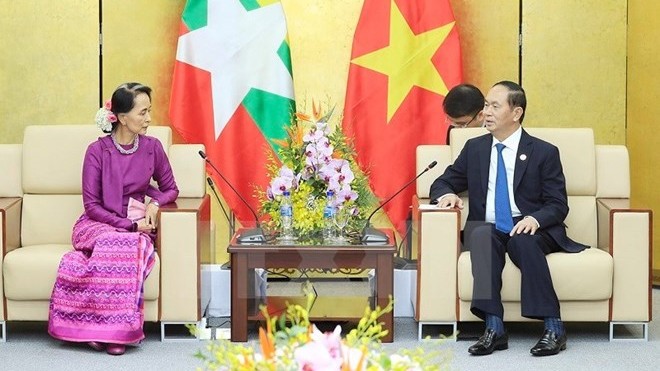 Le Président Trân Dai Quang et la conseillère d’État du Myanmar, Aung San Suu Kyi. Photo: VNA