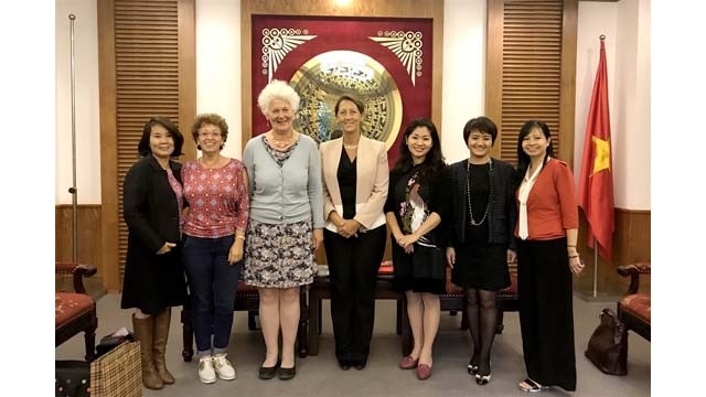 Les délégués vietnamiens et belges. Photo: Phuong Lan