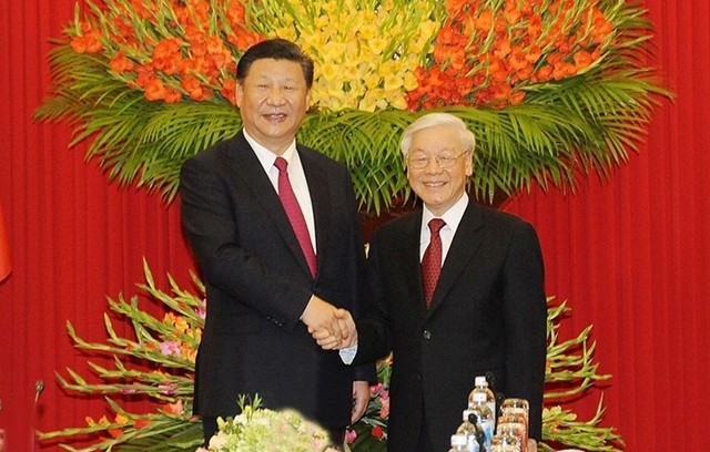 Le Secrétaire général du Parti communiste du Vietnam Nguyên Phu Trong (à droite), et le Secrétaire général du Parti communiste chinois et Président de la Chine, Xi Jinping. Photo : Trân Hai/NDEL.